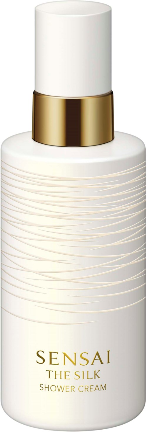 En vit flaska med guldkant, märkt Sensai The Silk Shower Cream, används för duschen.