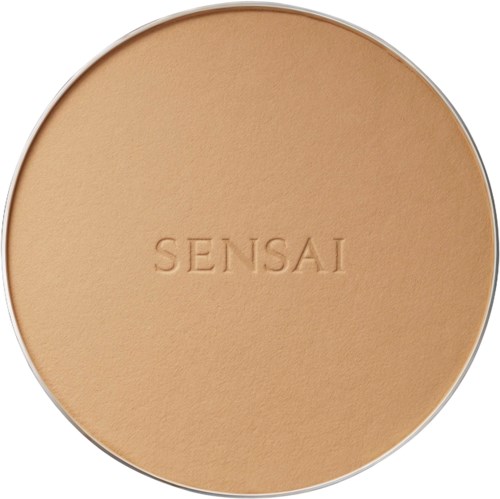 Pyöreä painettu puuterikotelo, jonka keskellä on 'SENSAI'-teksti beigeellä pinnalla.