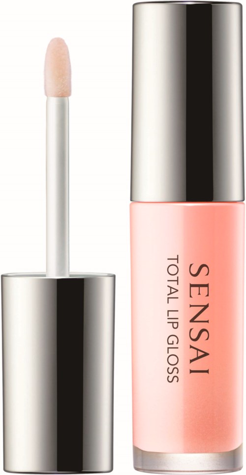 En liten tub med läppglans i rosa färg med en silverlock. Etiketten säger "SENSASI TOTAL LIP GLOSS."