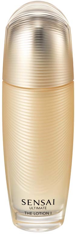 En gyldenfarvet, rund flaske med en skinnende hætte. Den er mærket "Sensai Ultimate The Lotion."