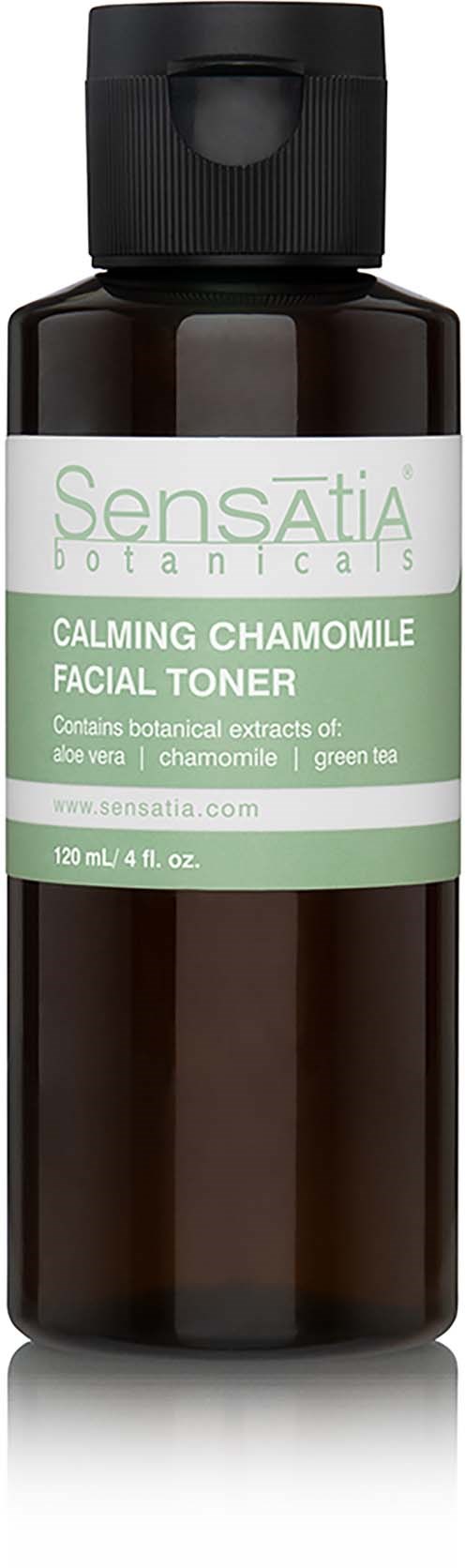 A dark bottle of calming chamomile facial toner with a white and green label, describing ingredients and brand.