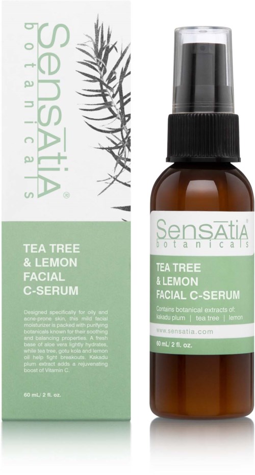 Een flesje en doos labeled 'Tea Tree & Lemon Facial C-Serum' van Sensatia Botanicals, voor huidverzorging.