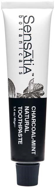 A white and black toothpaste tube with mint and charcoal flavor, labeled Sensatia Botanicals, natural, 150 grams.