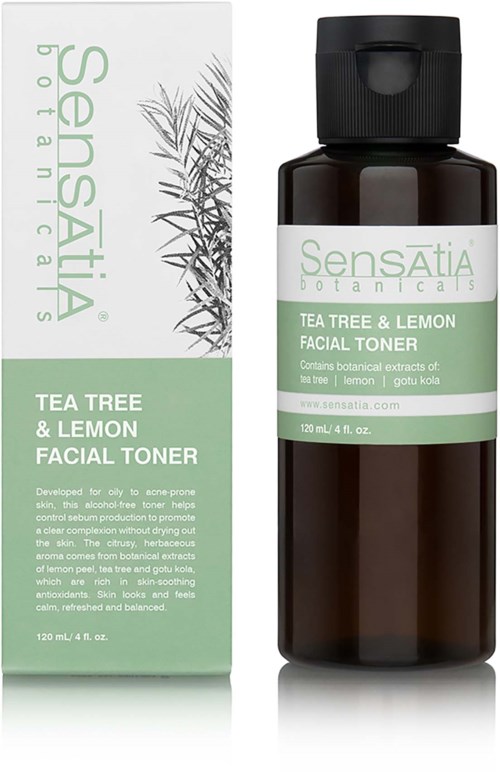 A dark bottle of facial toner next to its box, both featuring green and white labels for tea tree and lemon.