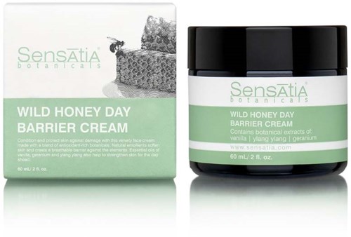 A jar and box of Sensatia Botanicals Wild Honey Day Barrier Cream, with green and white packaging design.