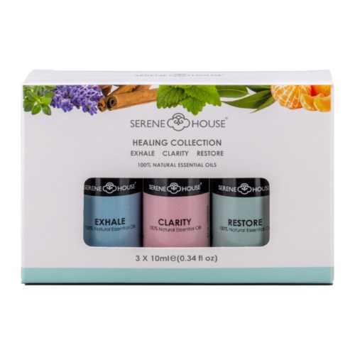 Sæt med tre essentielle olier i flasker mærket Exhale, Clarity og Restore, med blomster- og kanelgrafik på æsken.