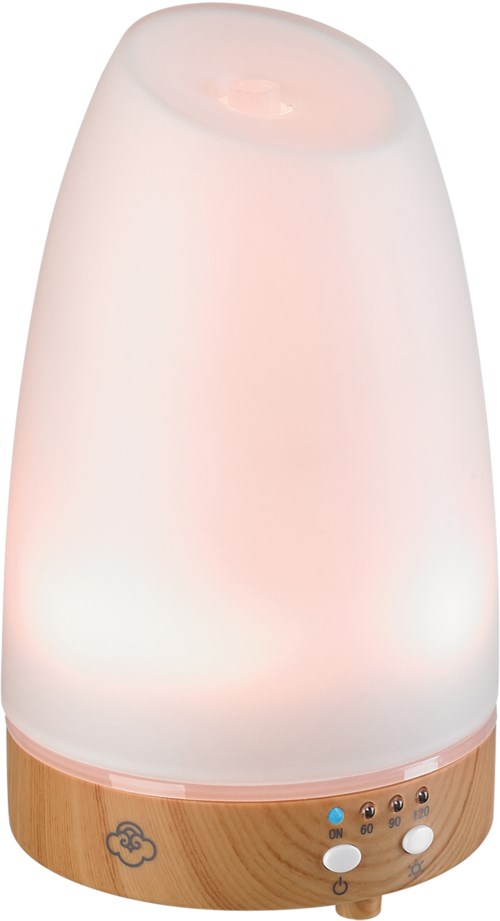 En lång, coneformad diffuser med trädrodsbas och kontrollknappar, som avger mjukt rosa ljus.