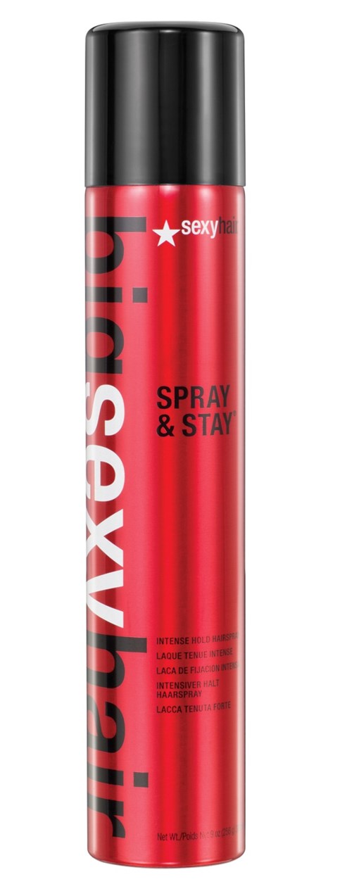 Röd sprayflaska med svart lock, märkt 'Sexy' och 'Spray & Stay' i fet stil.