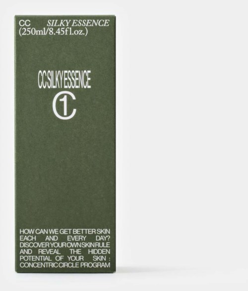Green box with white text for a skincare product named CCSLIKEESSENCE. Contains 250 ml. The box includes a slogan about better skin.
