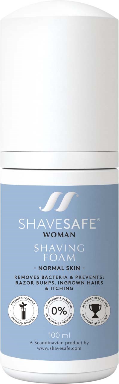 En vit spray med blå etikett, innehåller rakhyvfoam för kvinnor, hjälper att ta bort bakterier, förhindrar bumps och lugnar huden.
