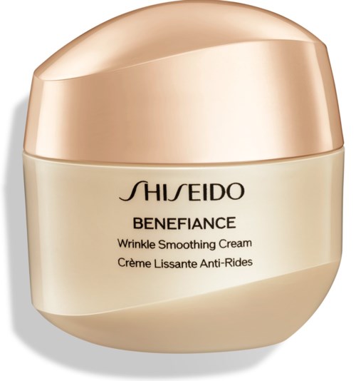 En burk med Shiseido Benefiance Rynkretskorrigeringskräm med rosa lock och beige kropp.