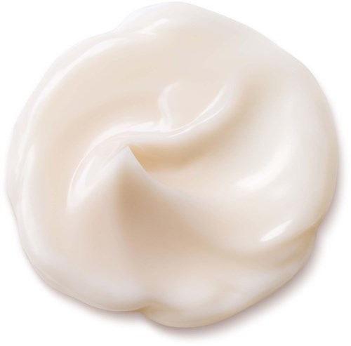 Cremehvid snoning, blød og glat tekstur, minder om flødeskum eller lotion.