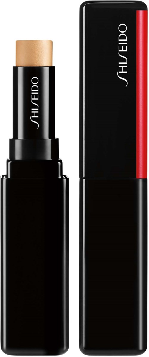 Svart leppestiftetui med en beige leppestift som er delvis åpen. Shiseido-merke på emballasjen.