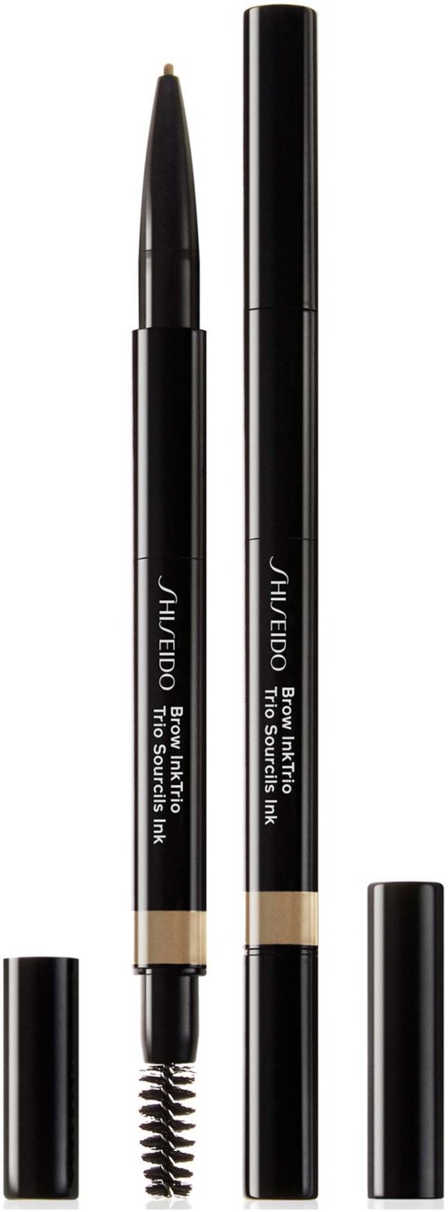 En japansk øjenbrynspen med spoolie kam, sort krop og sølvhætte, mærket Shiseido. Værktøj til øjenbrynsmakeup.