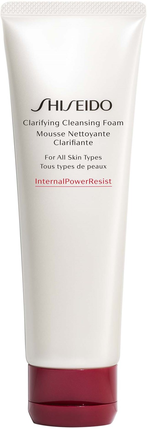 A white tube of Shiseido Clarifying Cleansing Foam with a red cap, labeled for all skin types and resistant to internal power.