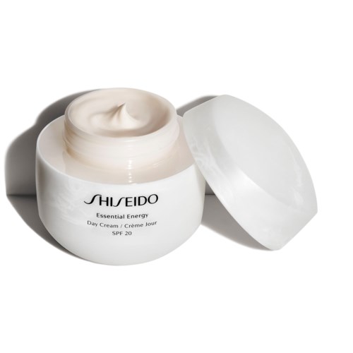 En hvid krukke med Shiseido Dagcreme med SPF 20, åbnet for at vise cremet tekstur.