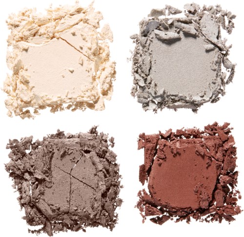 Vier zerdrückte Make-up-Puder in verschiedenen Farbtönen: hell, grau, dunkel und rot.