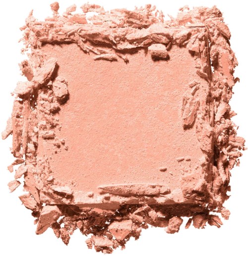 Pink pressed powder with a square shape, surrounded by scattered crumbs.