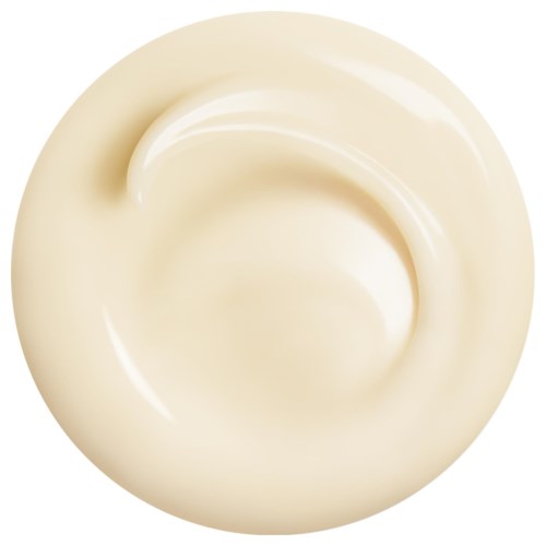 Krämfärgad klicka med glänsande, slät yta och spiralform.