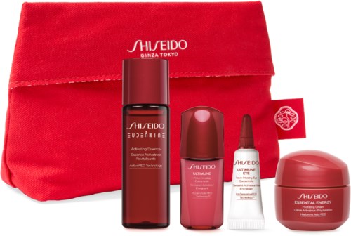 En uppsättning hudvårdsprodukter i röda förpackningar med en matchande röd väska från Shiseido. Perfekt för hudvård.