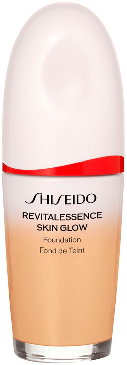 Shiseido Revitalessence Skin Glow foundation with a white bottle and a red line.