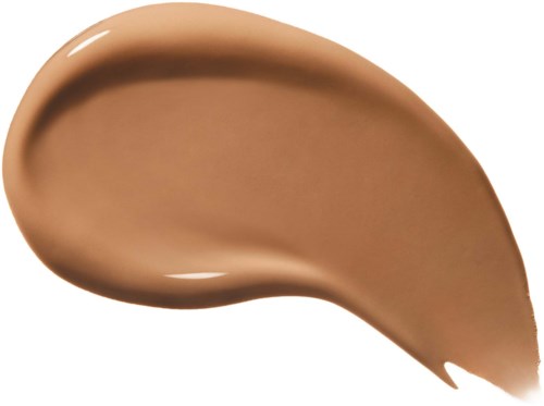 Ett streck av beige eller ljusbrun kräm, slätt och böjt, på en vit bakgrund.