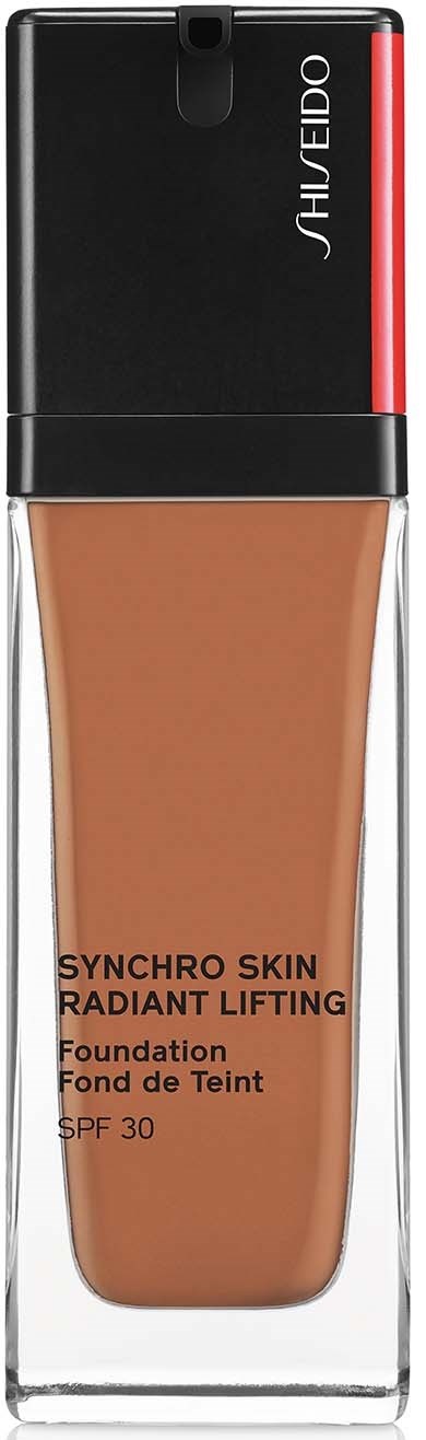 A foundation bottle with a black cap, transparent body, and red accent. The label shows it's for radiant lifting with SPF 30.