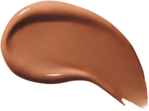 A smear of brown makeup or foundation with shiny and matte areas. It looks smooth and creamy.