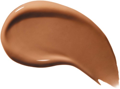Ett streck av ljusbrun flytande makeup eller foundation på en vit bakgrund.