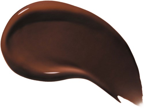 En fläck av mörkbrun glansig makeup eller färg med en spetsig ände.