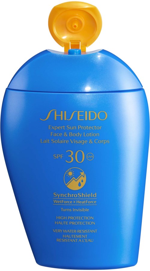 Blå flaska med Shiseido solskyddslotion med SPF 30 och flip-top lock.