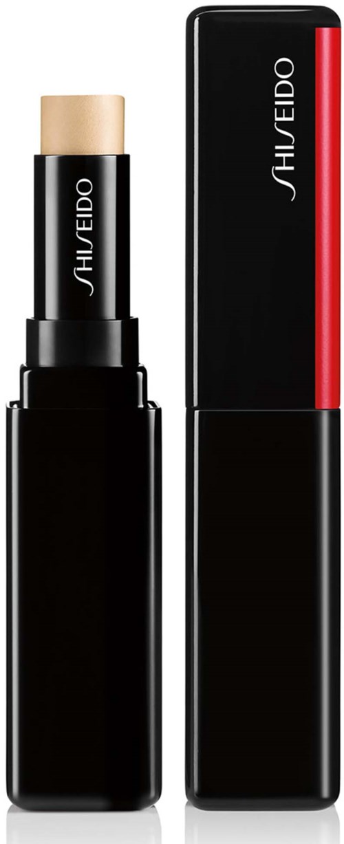 Ett läppstiftshölje med märket Shiseido, svart och röd design, och en beige läppstift inuti.