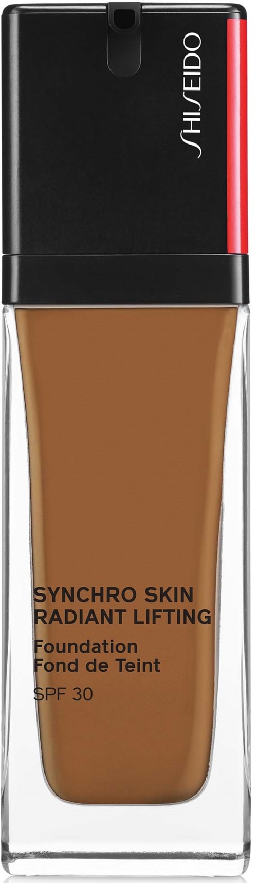 En foundationflaske med svart lokk, merket 'Shiseido Synchro Skin Radiant Lifting,' med SPF 30, i gjennomsiktig beholder.