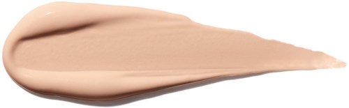 En stripe med beige foundation eller krem med spissen mot høyre og glatt tekstur.