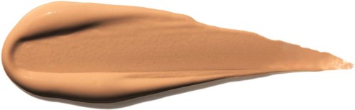 En beige krem eller foundations er spredd på en hvit bakgrunn, med en liten spiss ende.