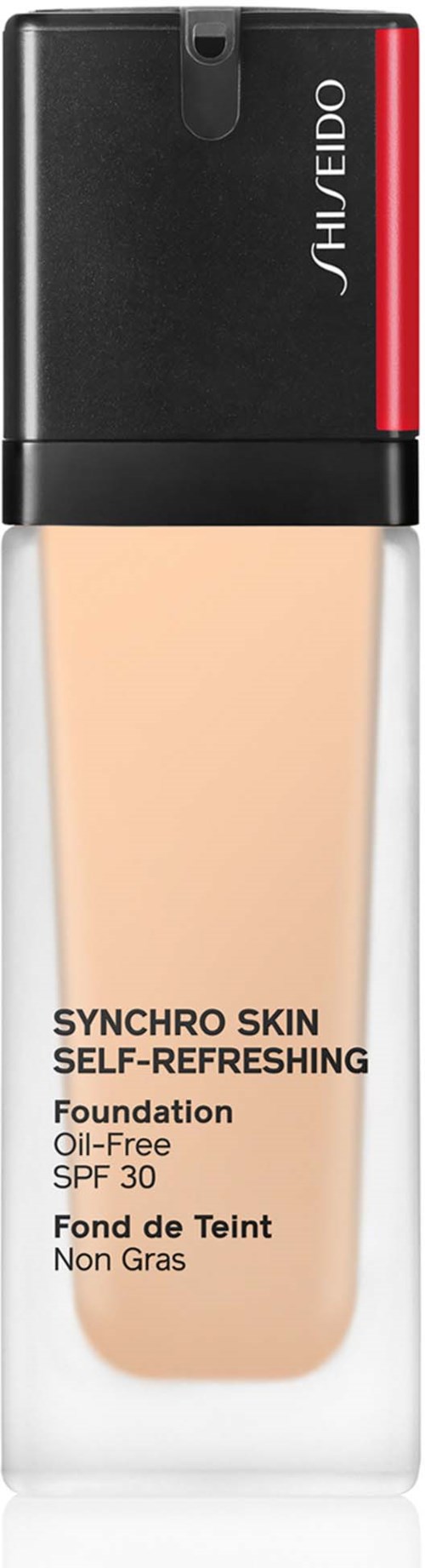 Ein Foundation-Flasche mit schwarzen, roten und transparenten Teilen, beschriftet "SHISEIDO" und "SYNCHRO SKIN SELF-REFRESHING."