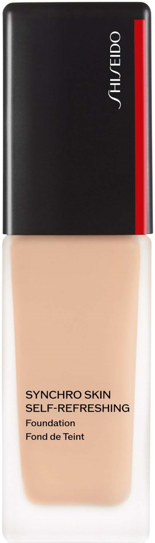 En foundationflaska med svart och rött lock, som innehåller ljus beige flytande för huden, märkt 'Synchro Skin Self-Refreshing' av Shiseido.