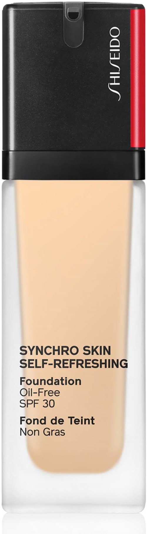 En flaska foundation med svart och rött lock, märkt 'Synchro Skin Self-Refreshing' och SPF 30.