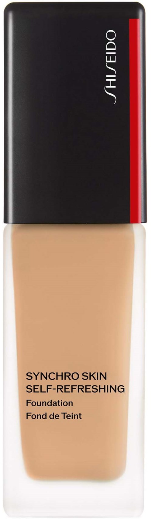 En flaska foundation med svart, rött och vitt förpackning, märkt Shiseido Synchro Skin, självuppfriskande.