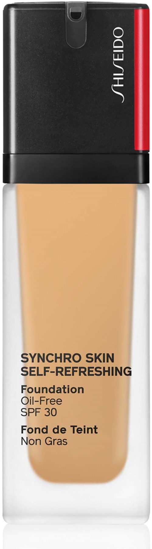 Czarna i czerwona butelka z fluidem w odcieniu beżu, oznaczona "Synchro Skin Self-Refreshing Foundation SPF 30."