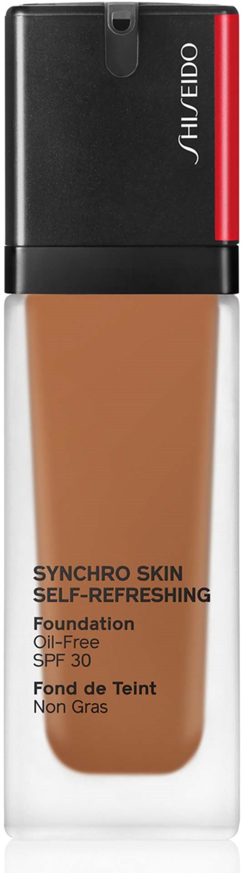 Eine Foundation-Flasche mit schwarzem und rotem Deckel, beige Flüssigkeit, beschriftet 'SYNCHRO SKIN SELF-REFRESHING' mit SPF 30.