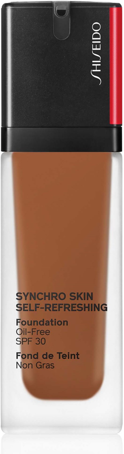 Eine Flasche Make-up-Grundierung mit schwarzem Deckel und rotem Akzent, beschriftet "Shiseido Synchro Skin Self-Refreshing SPF 30."