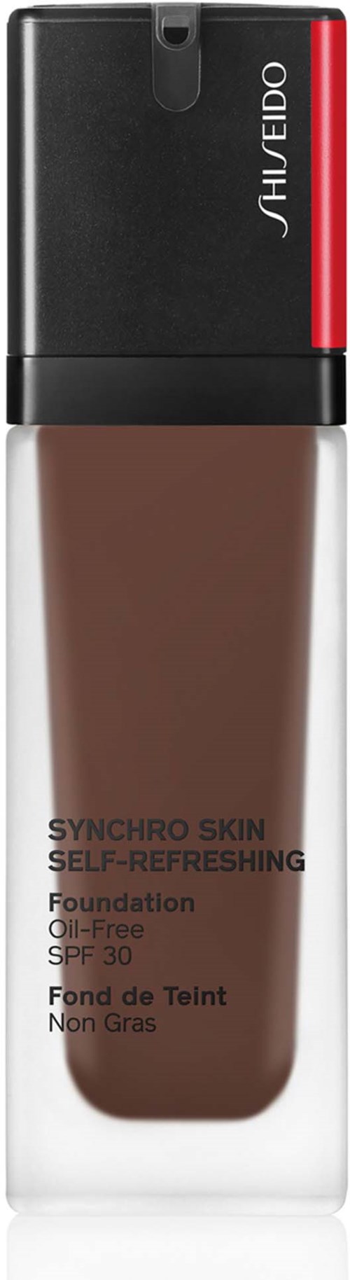 Eine Flasche Shiseido-Foundation mit schwarzem und rotem Verschluss, genannt Synchro Skin Self-Refreshing Foundation, öl-frei, SPF 30.