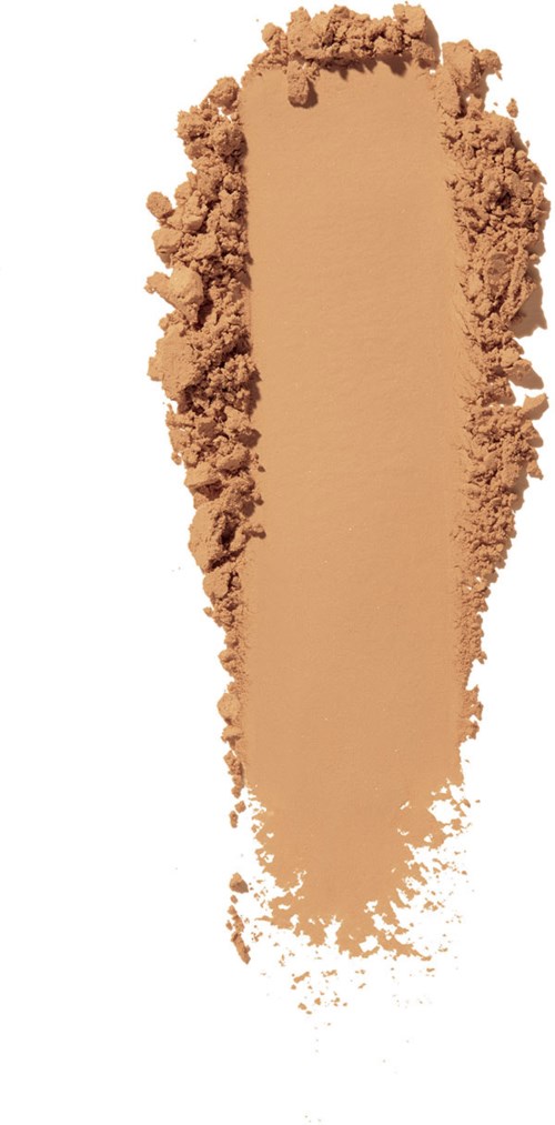En beige makeuppudder spredt ud på en hvid baggrund.