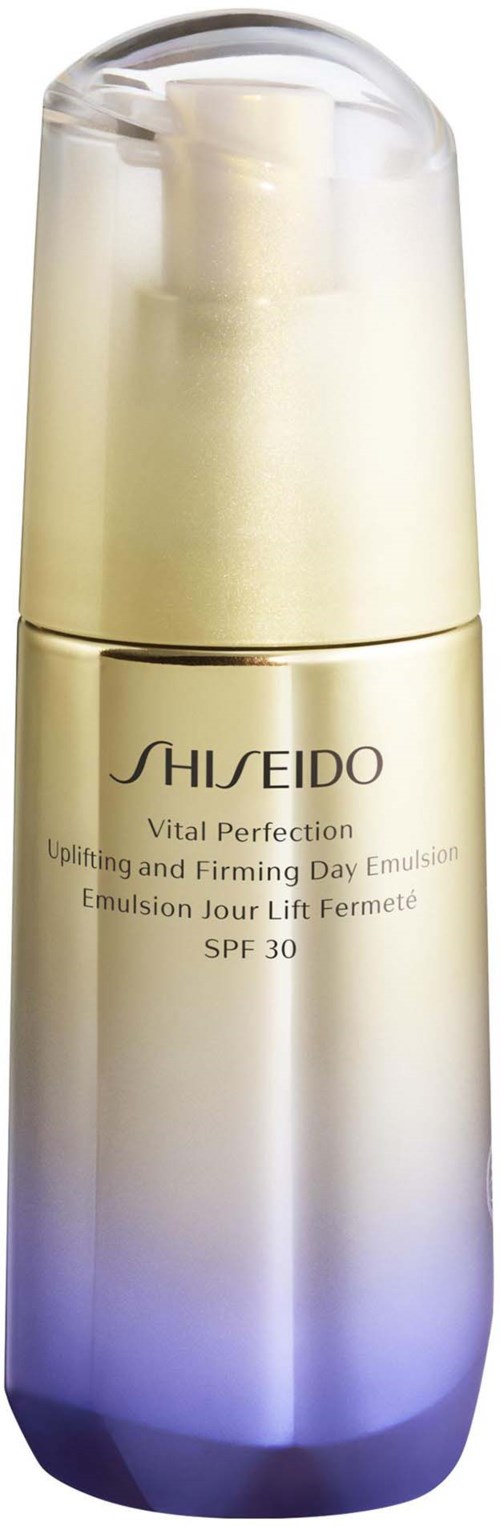 En Shiseido hudvårdsprodukt i en guldfärgad och lila flaska med pump, märkt som förfastande dagemulsion med SPF 30.