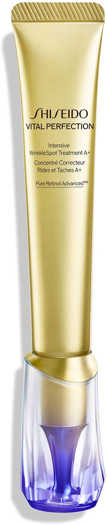 En gullfarget tube med lilla og sølvfarget hette, merket Shiseido Vital Perfection, inneholder hudpleieprodukt.