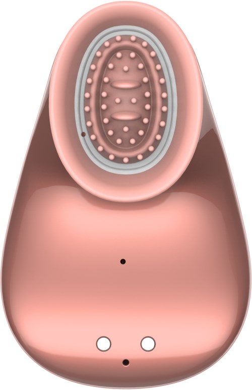 A pink device with a circular top containing small dots and a button on the lower part.