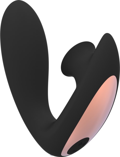 En svart och rosa enhet med rund form och liten kontroll, möjligen en massager eller gadget.