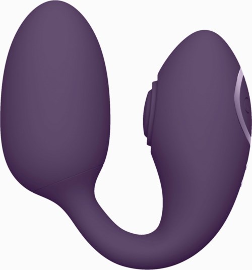 Ein lila Gerät mit zwei großen Teilen, verbunden in einer Hakenform, möglicherweise eine Massagegerät oder ähnliches.