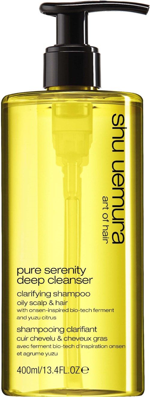 Gul flaska med svart pump, märkt 'shu uemura'. Innehåller 'pure serenity deep cleanser' för hår och hårbotten. 400ml storlek.
